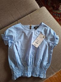 Camicetta bambina taglia 110 cm nuova.