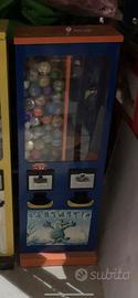 Distributore meccanico palline sorprese gioco