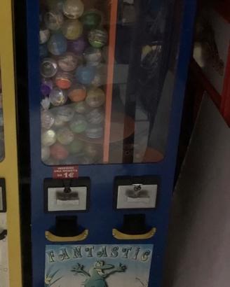 Distributore meccanico palline sorprese gioco