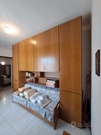 Letto e armadiatura a ponte