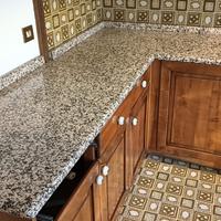 Top cucina in granito con piano cottura