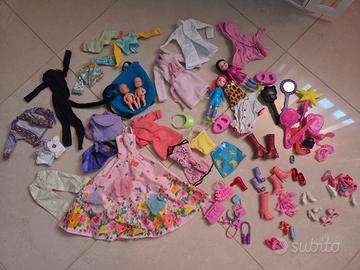 Lotto accessori e vestiti Barbie
