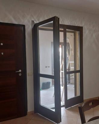 portafinestra doppia anta in legno con vetrocamera