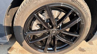 PNEUMATICI BRIDGESTONE CON CERCHI IN LEGA NERI