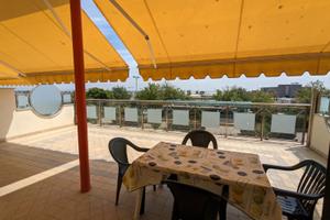 Elegante, fronte mare in centro con posto auto