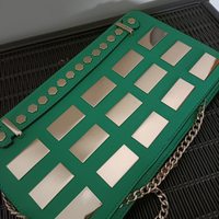 Pochette verde e oro