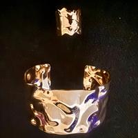 Bracciale e anello rigidi