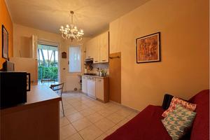 Villetta con giardino in villaggio con piscina