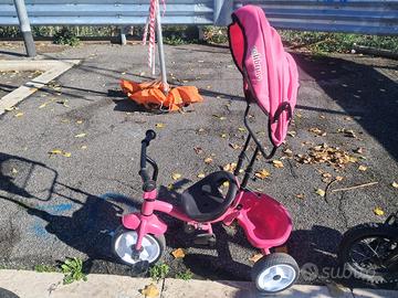 Triciclo con cappottina