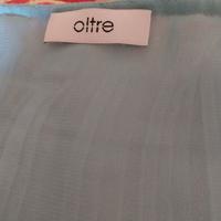 Vestito ampio e lungo Oltre