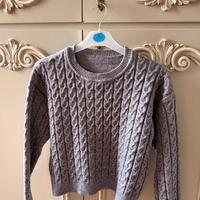 Maglia grigia con treccia