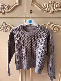 Maglia grigia con treccia