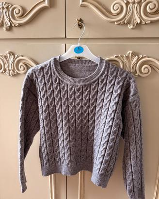 Maglia grigia con treccia
