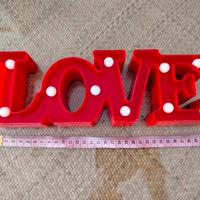 insegna luminosa Love