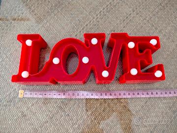 insegna luminosa Love