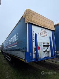 0487 SEMIRIMORCHIO CENTINATO CON SPONDE