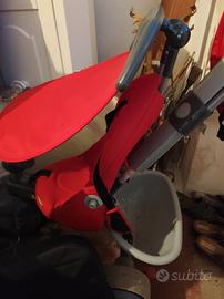 triciclo con pedali e maniglia