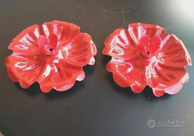 Coppia portacandele rossi in metallo