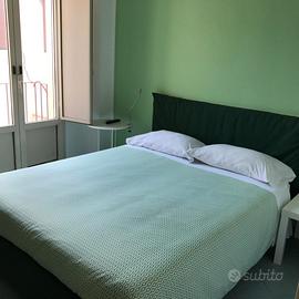 Accogliente camera con balcone