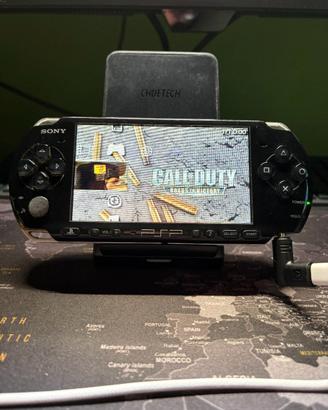 PSP 3004 + caricatore + memory stick 64 GB