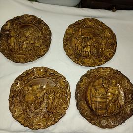 piatti in legno intarsiato 