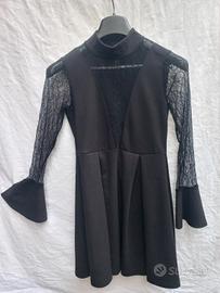 Elegante vestito nero con maniche in pizzo .tag.40