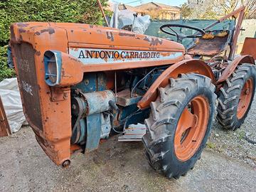 Carraro Tigre  con aratro e estirpatore