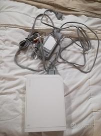 Nintendo Wii+2 telecomandi, 2 volanti e 2 nunchak