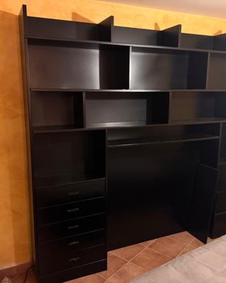 letto singolo e libreria