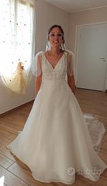 Abito da sposa con velo