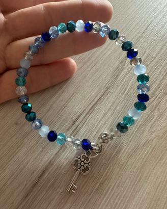 Bracciale semirigido cristalli blu ciondolo chiave