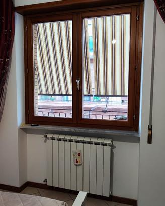 finestra in legno con vetro camera