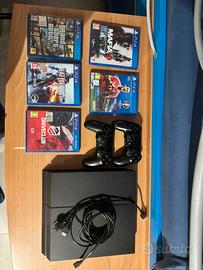 PS4 500GB+2 controller+5 giochi+Cavi-Come nuova
