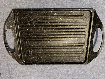 Piastra per tutti i tipi di piano cottura