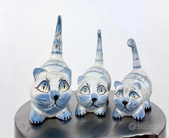Tris gatti in legno