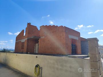 Terreno con casa indipendente da ultimare