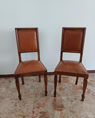 N. 2 sedie in radica e pelle.