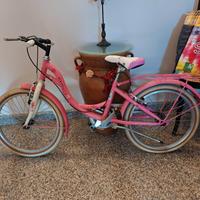 bici colore rosa 