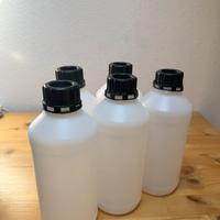 5 bottiglie in plastica 1 litro con tappo