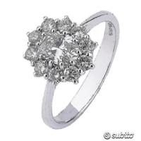 ANELLO IN ORO 18kt. CON DIAMANTI E DIAMANTE OVALE