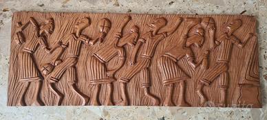 Pannello di legno scolpito, di origine africana.