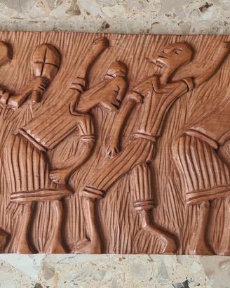 Pannello di legno scolpito, di origine africana.