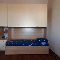 Armadio a ponte con 2 letti singoli