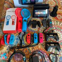 Nintendo switch + 3 Joy-con + Racchette Tennis +++