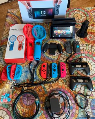 Nintendo switch + 3 Joy-con + Racchette Tennis +++