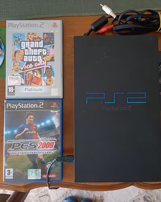 PlayStation 2 Fat + Cavo AV + 4 Giochi