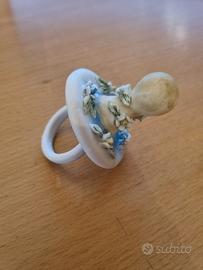 Ciuccio celeste in porcellana