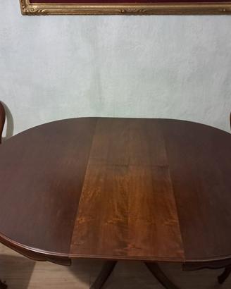tavolo rotondo allungabile di legno con sedie