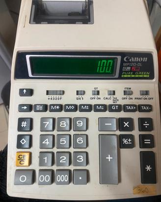 Calcolatrice canon con rotolini carta