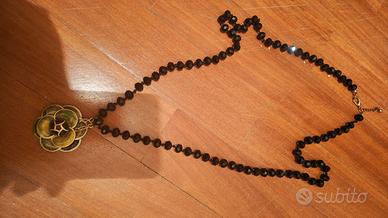 Collana era con ciondolo fiore